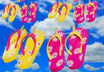 colorful flipflops under cloudy sky