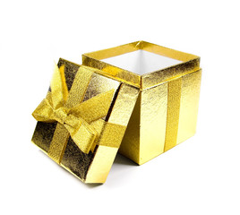 Opened golden shining gift box isolated on white.