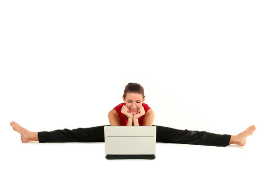 Woman Doing A Split And Using Laptop