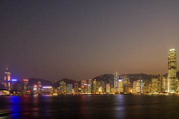 Obraz na płótnie Canvas Skyline of Victoria Harbour in Hong Kong at dusk