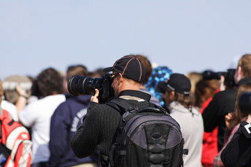 photographe avec casquette