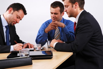 Fototapeta premium business man signing a contract