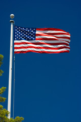 American flag and blue sky