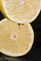 Grapefruit on the black background