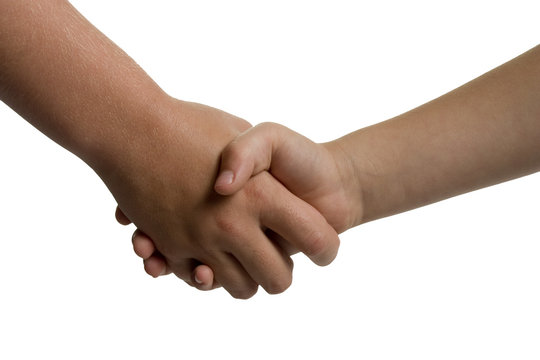 young children shaking hands