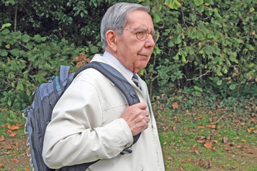 Retired man with rucksack