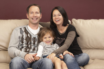Fototapeta premium parents with small daughter