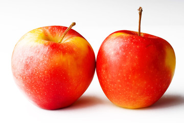 two red apples isolated on white