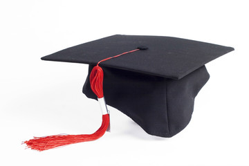 graduation cap with a red tassel 