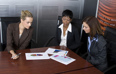 Three female business