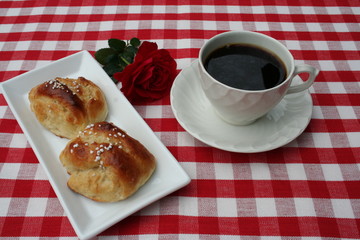 Coffee with buns is served