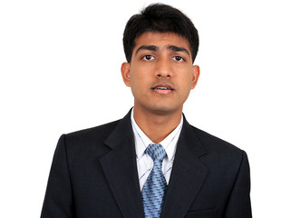 Young Indian business man in puzzled pose