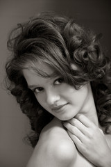 Beautiful teen girl with brown curly hair