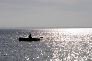 Silhouette of the fisherman