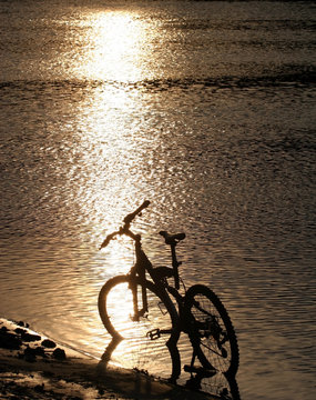 Bike silhouette in the river