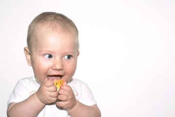 small smiling boy and dummy