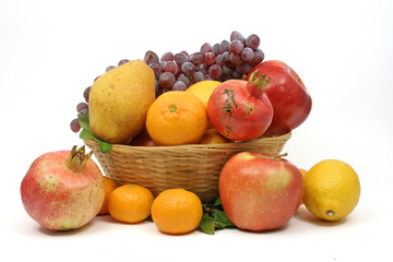 Naklejka na ściany i meble Mediterranean fruit basket isolated on white