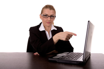 business woman to point on laptop