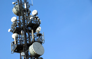 Communication Tower with blue sky background and copyspace