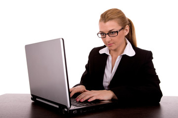 Business woman write by laptop