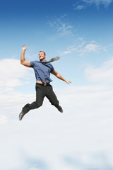 Businessman jumping