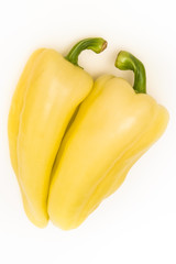 Two yellow peppers