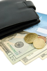 black wallet, visa card, cents and 20 dollars