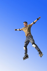Fototapeta na wymiar active roller boy jumping