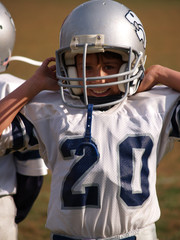 Happy young football player