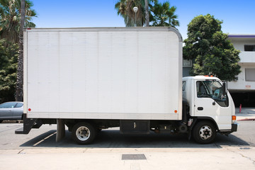 White delivery truck at a street, clipping paths included - 4973945