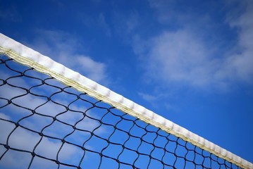 tennis net under blue sky