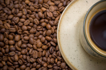 morning cup of coffee in beans