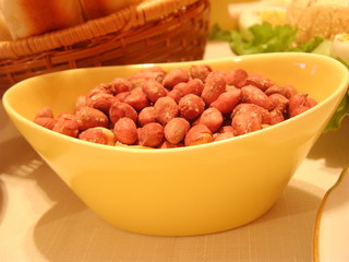 peanuts in yellow dish