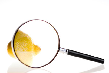 Lemon under magnifying glass