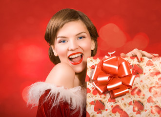 christmas girl holding a gift box