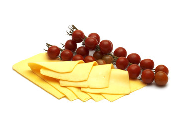 cheese and tomatoes on white background