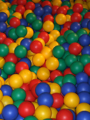 Fototapeta na wymiar Multi-kolorowe kulki w basenie plac zabaw