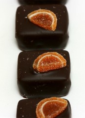 Exquisite black chocolate candies - close-up