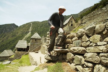 Tourist in the city Machu-Picchu