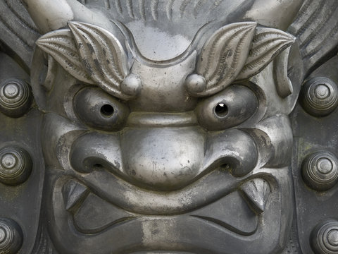 Iron face statue