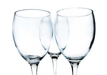 Empty wine glasses on white background