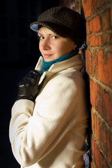 Beautiful girl in european old city at night time