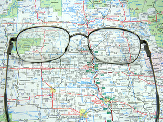 Road USA map and glasses