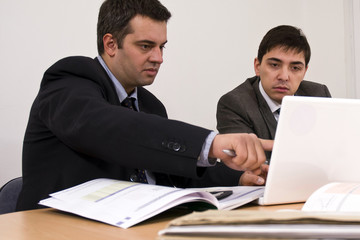 concerned explanation on a white laptop