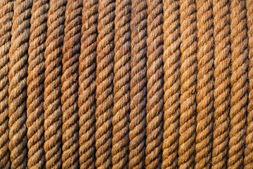 Natural background of coiled rope in old workshop