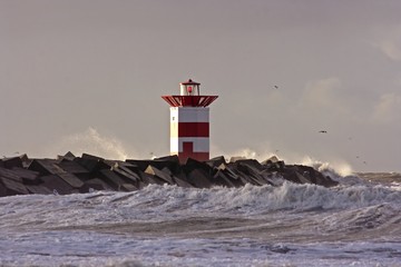 Lighthouse at a storm in Holland