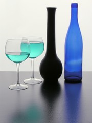 still life and shades of blue colour in transparent glass