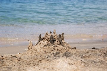 Fototapeta na wymiar Crumbling Sand Castle