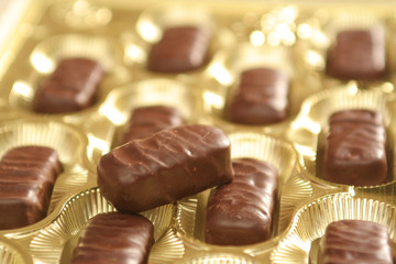 Box with chocolate tasty sweets