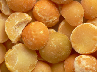 Dried-up splitted chick-peas close-up